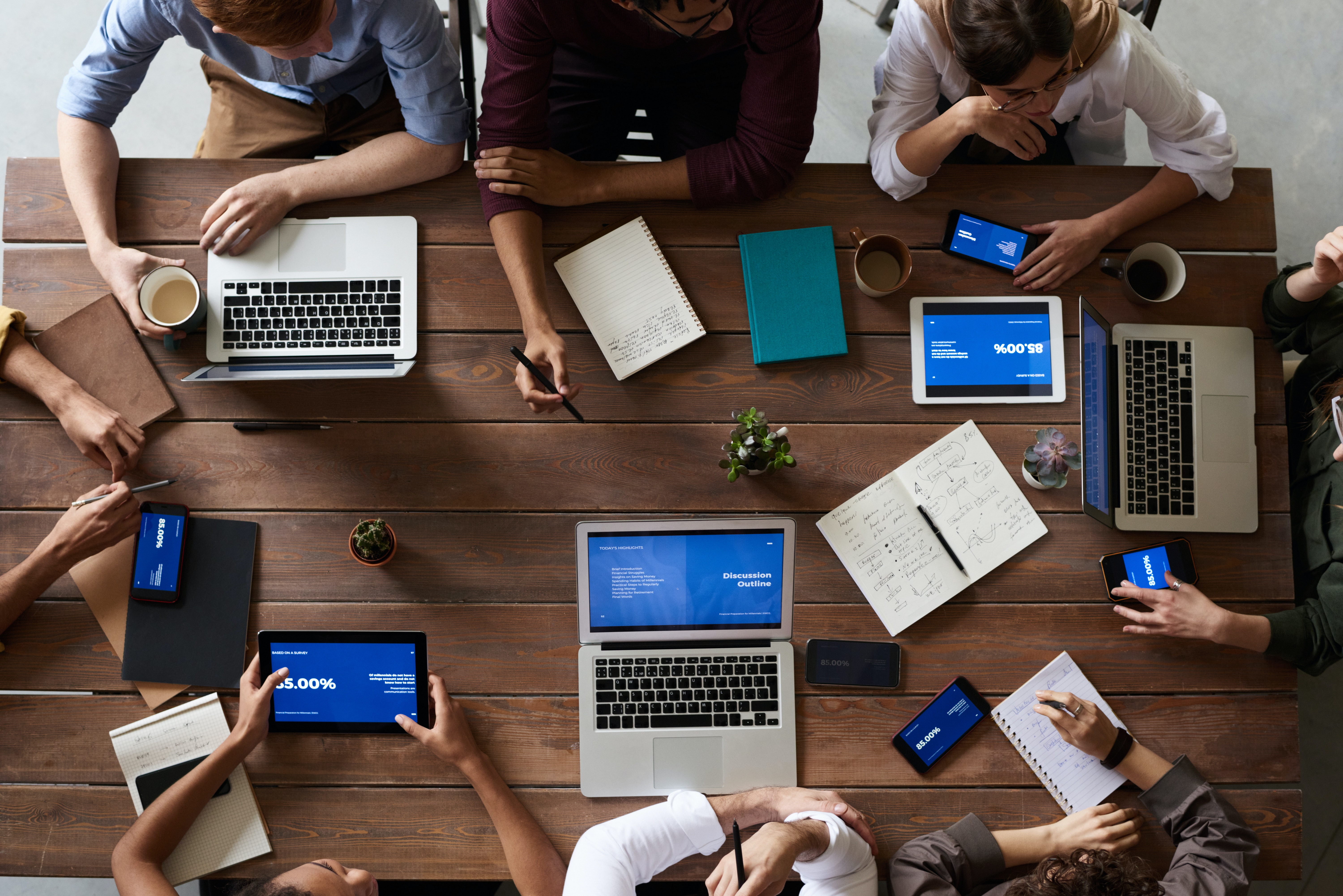 A team collaborating at a desk.